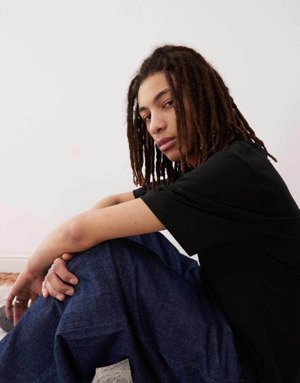 Weekday relaxed fit heavyweight jersey t-shirt in black Product Image