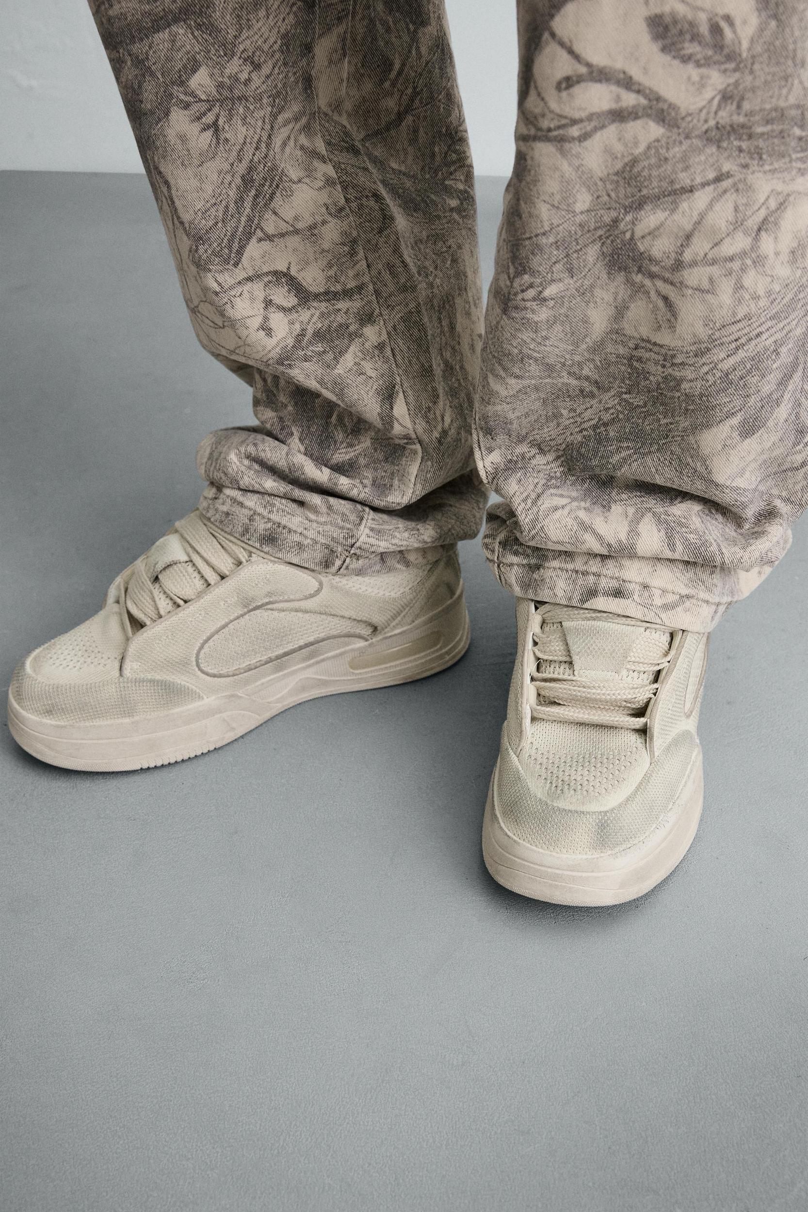 DISTRESSED THICK-SOLED SNEAKERS Product Image