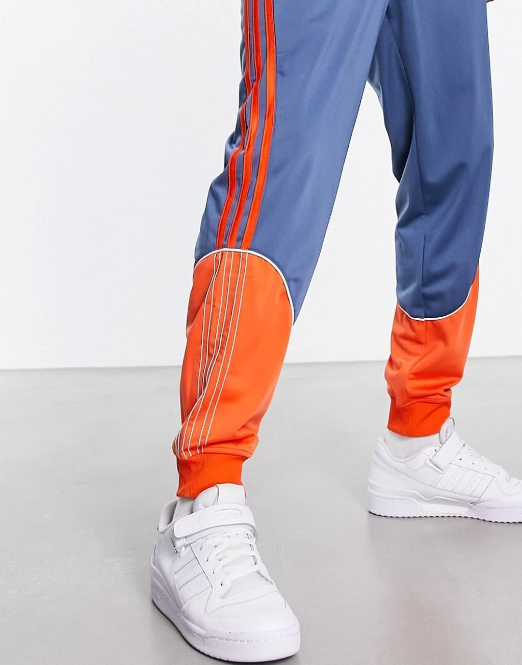 adidas Originals SPRT tricot track pants in blue and orange Product Image