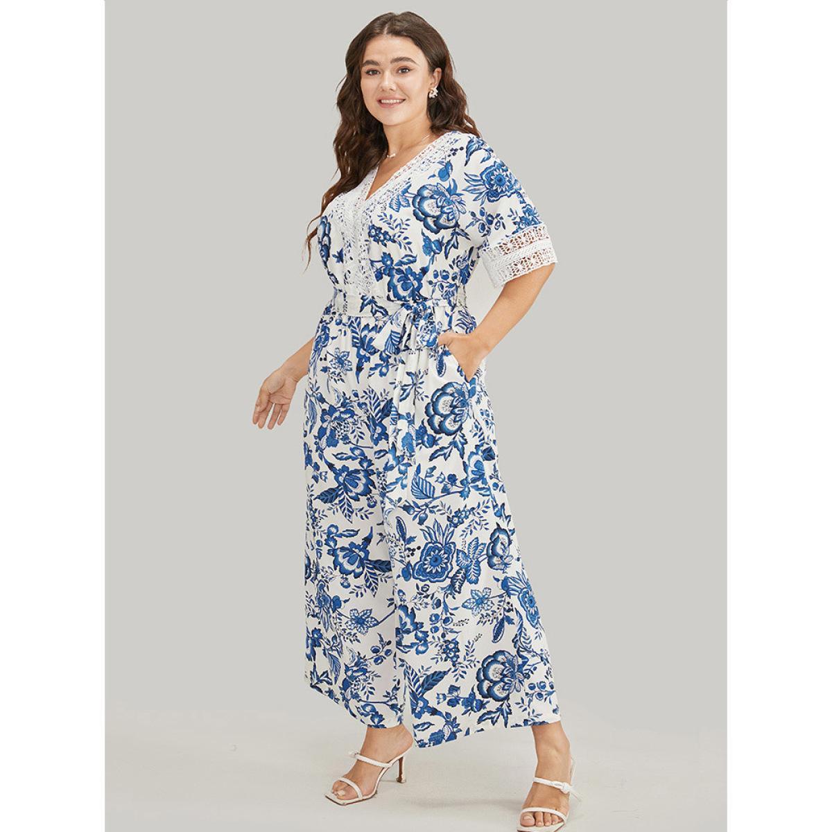 Plus Size Navy Floral Belted Pocket Lace Trim Wrap Jumpsuit Women Vacation Short sleeve V-neck Dailywear Loose Jumpsuits BloomChic 30/6X Product Image