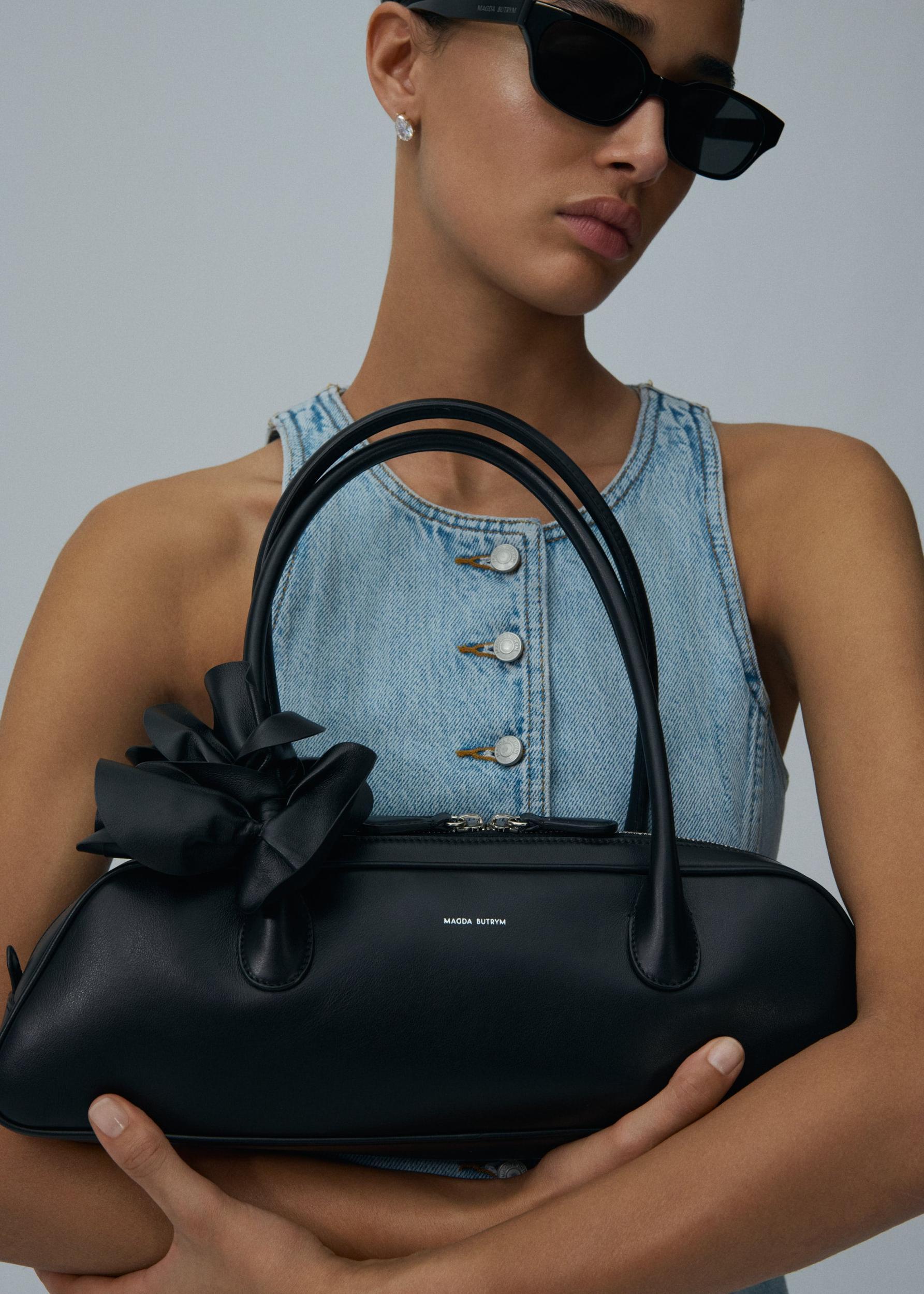 Brigitte trapeze bag in black leather and silver Product Image