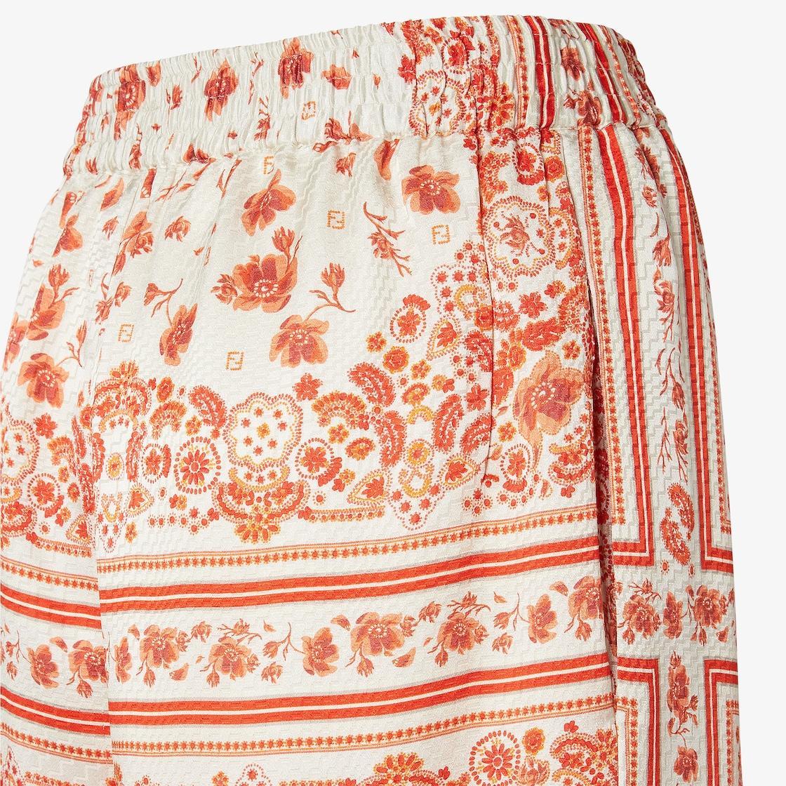 PantsSilk pants with Coral Bandana print Product Image