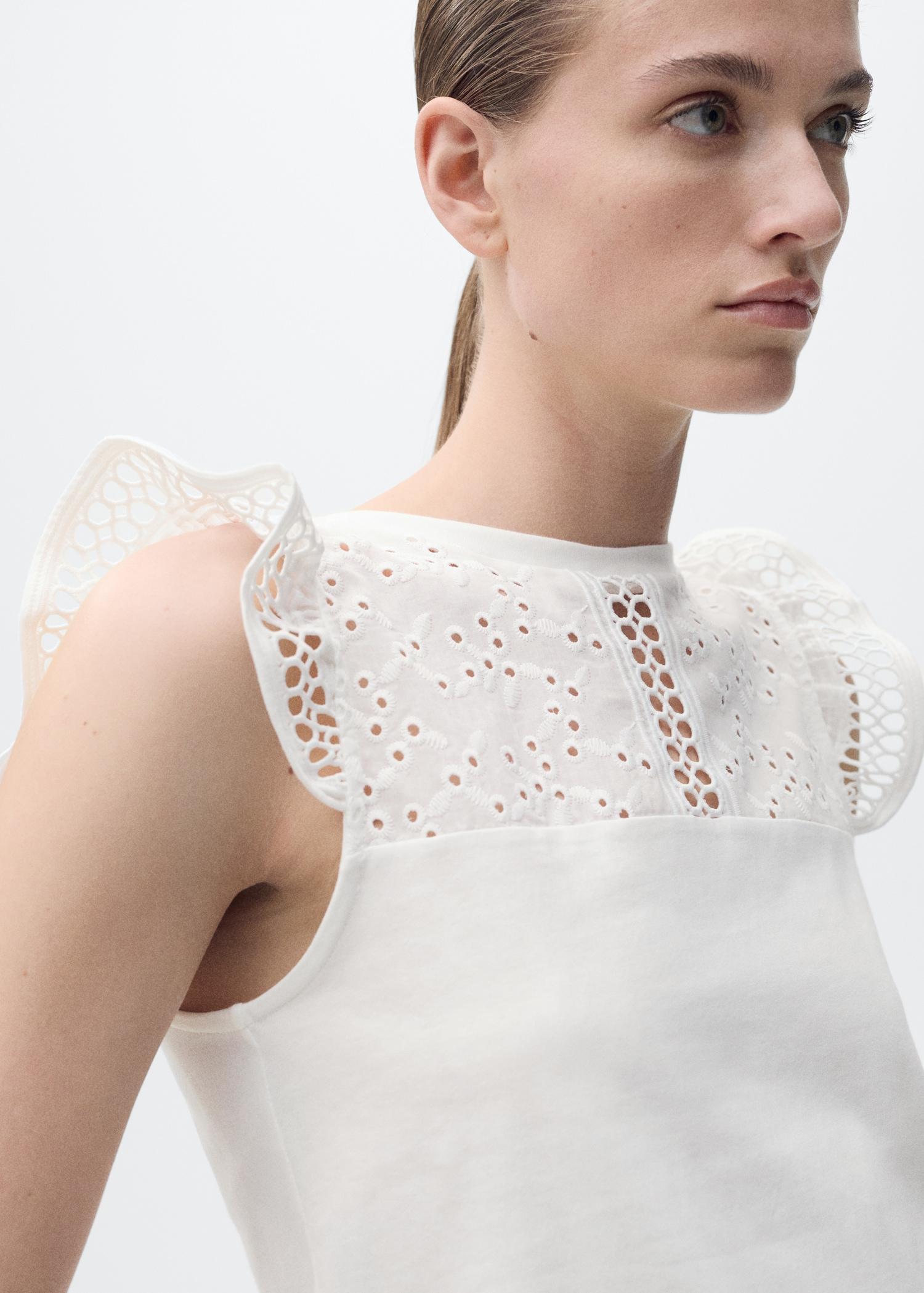 Cotton top with openwork neckline - Women | MANGO USA Product Image