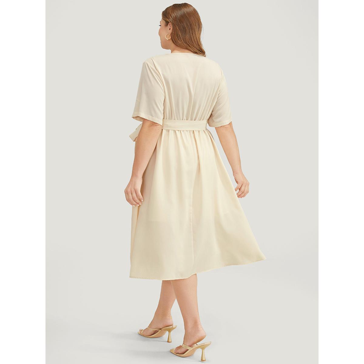Plus Size Solid Chain Detail Cut Out Pocket Belted Flutter Dress Beige Women Office Cross straps V-neck Short sleeve Curvy Midi Dress BloomChic 10/M Product Image