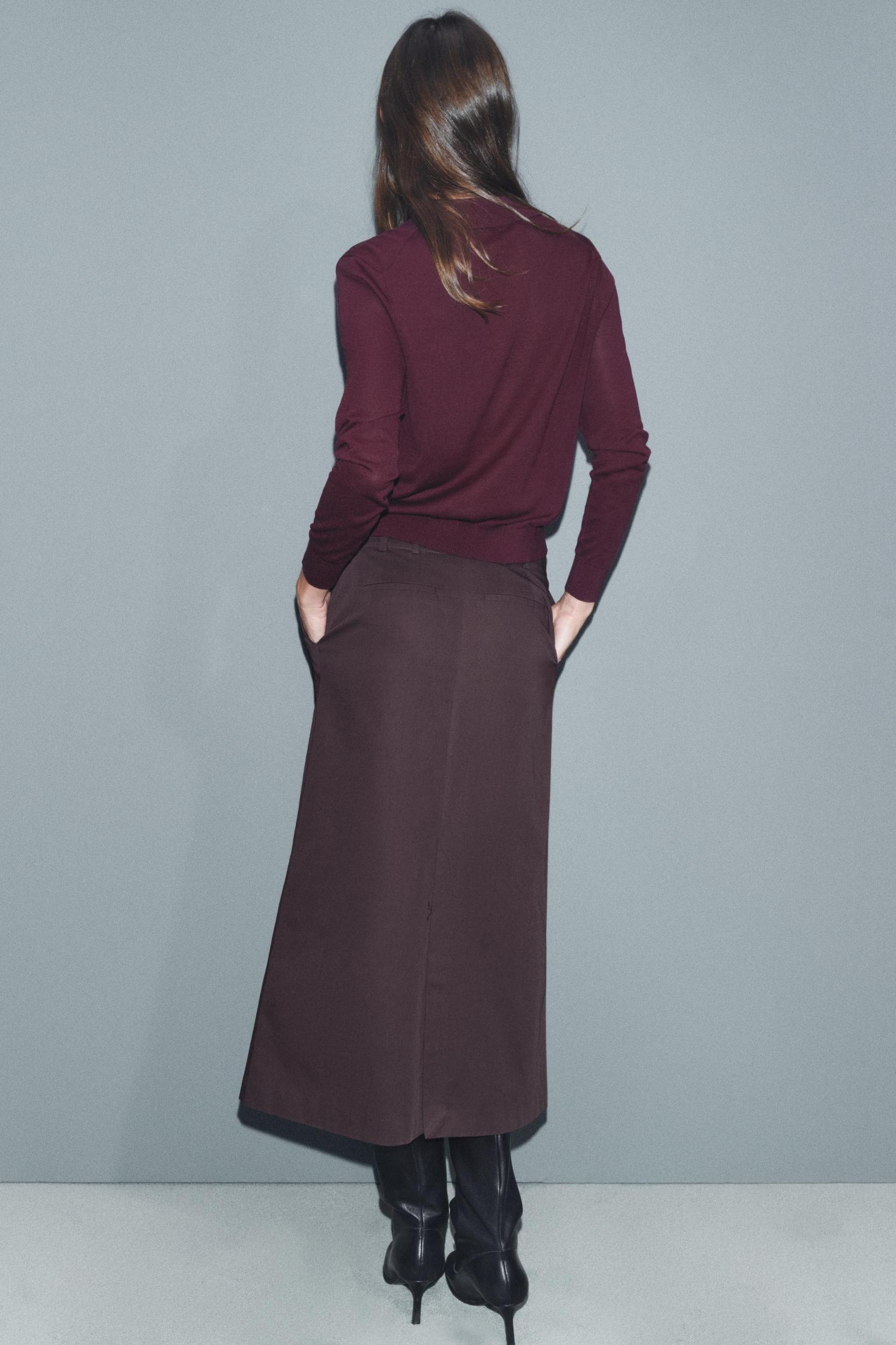 BUTTONED KNIT POLO TOP Product Image
