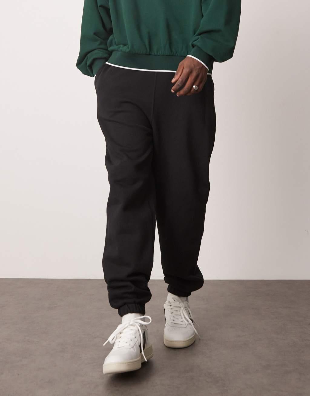 ASOS DESIGN oversized sweatpants in black Product Image