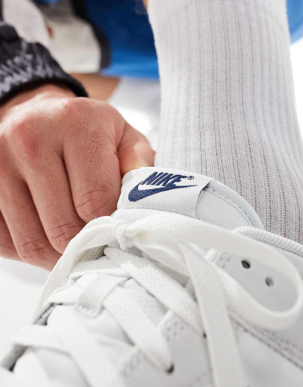 Nike Dunk Low Retro sneakers in white and navy Product Image