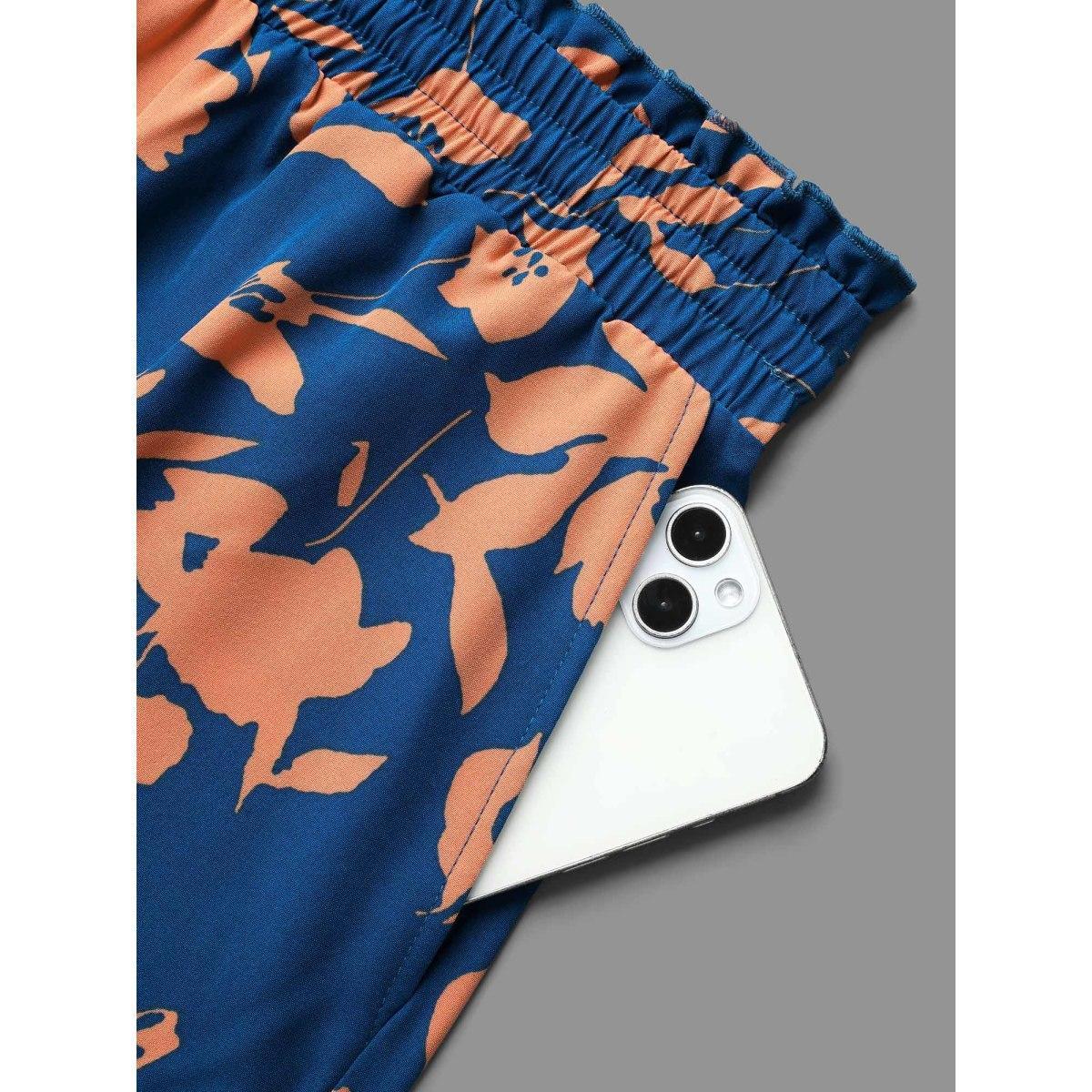 Plus Size Floral Smocked Waist Flared Leg Pants Women DarkBlue Elegant Wide Leg Mid Rise Everyday Pants BloomChic 30/6X Product Image