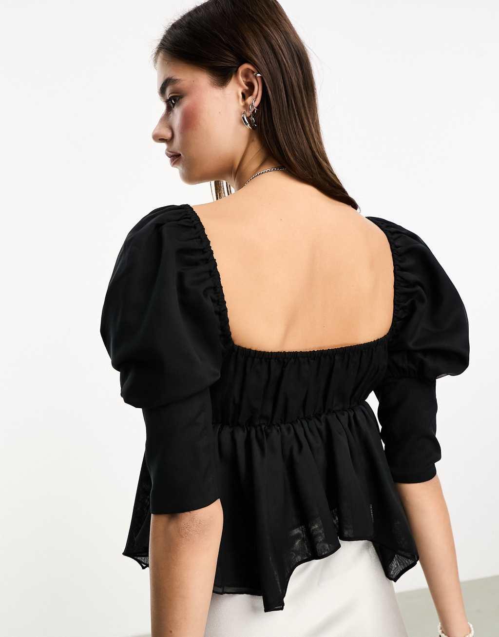 Reclaimed Vintage blouse with puff sleeve and asymmetric hem-Black Product Image