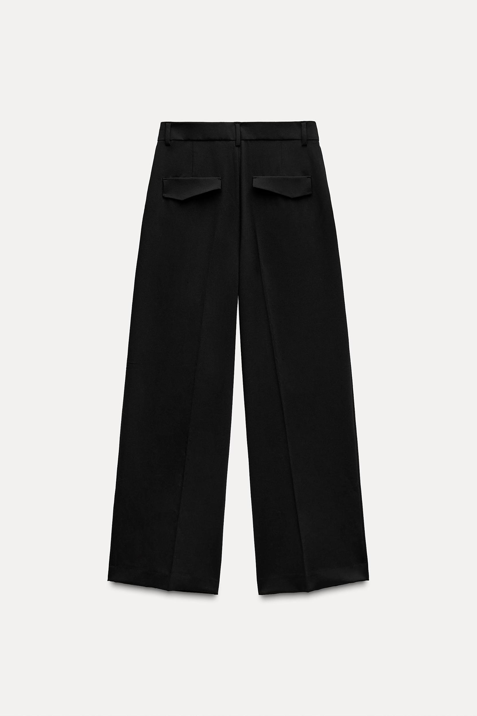 PLEATED PANTS WITH POCKETS Product Image
