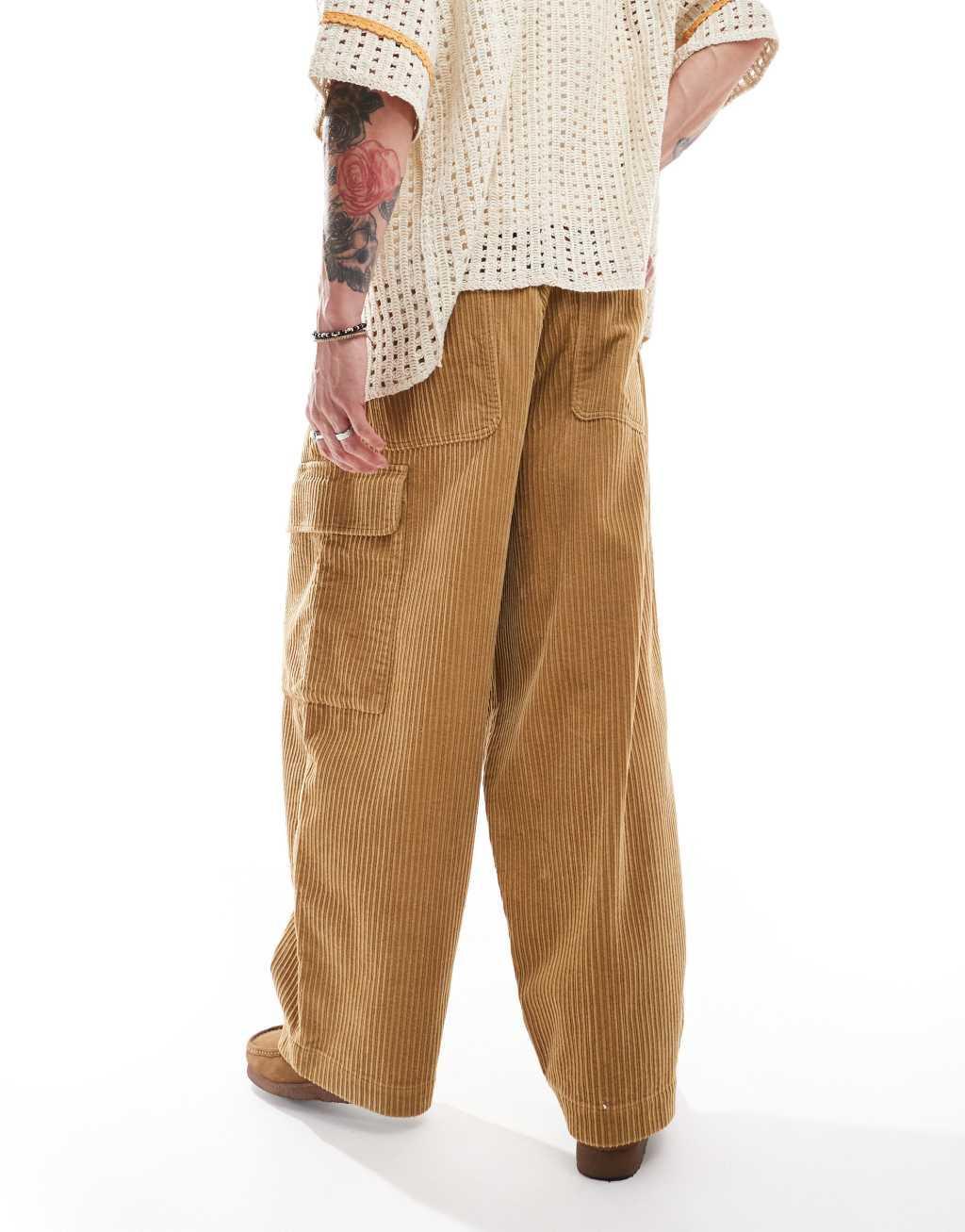 ASOS DESIGN baggy balloon pleated cord cargo pant in tan Product Image