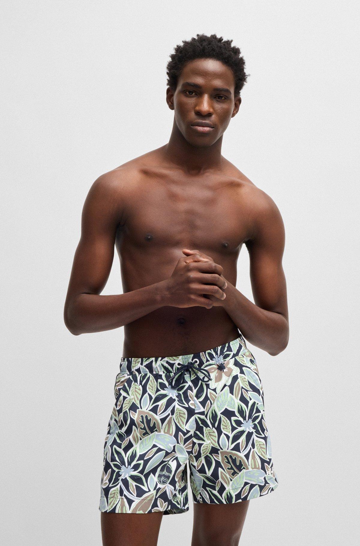 HUGO - Fully lined swim shorts with seasonal print - Dark Blue Product Image