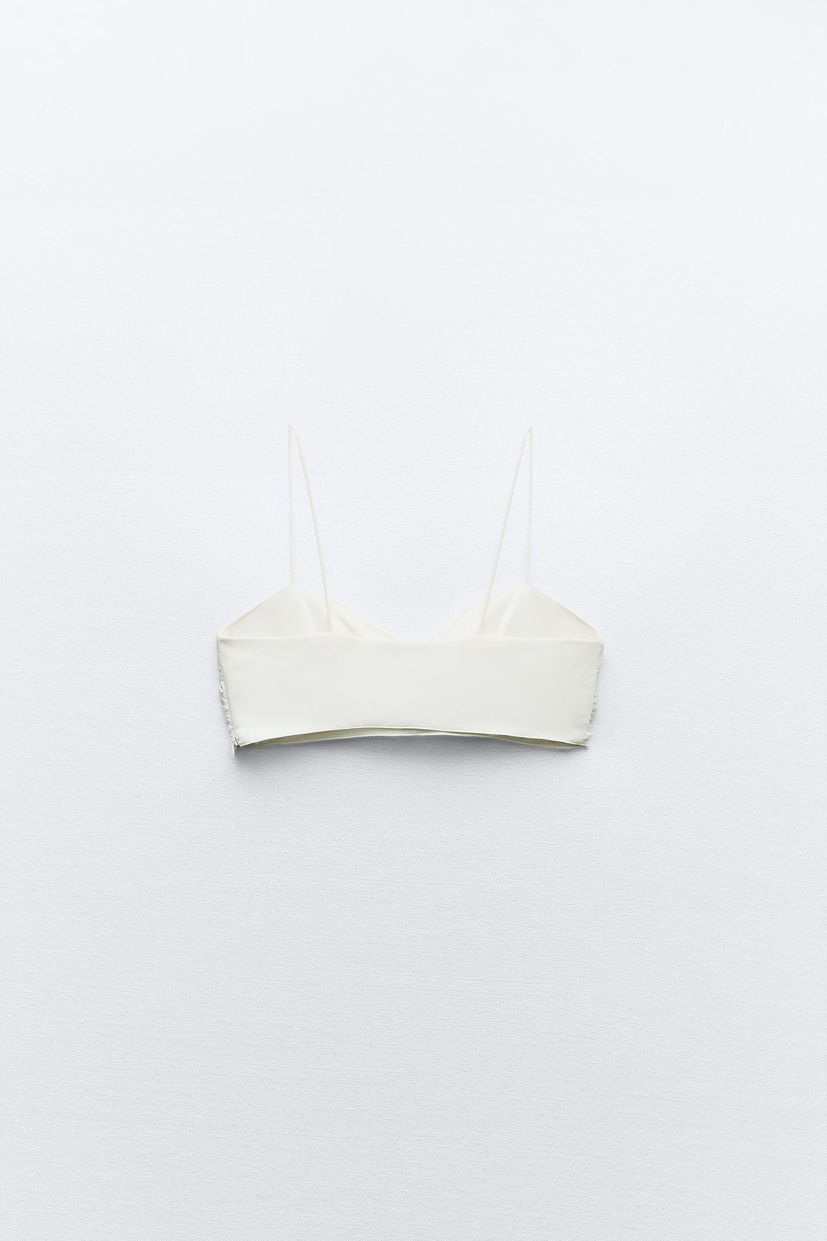 DRAPED TOP WITH TEXTURED FLOWERS Product Image