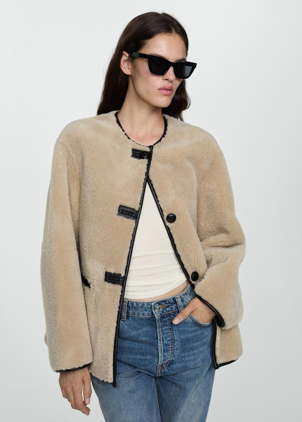 Fur-effect coat with appliqués - Women | MANGO USA Product Image
