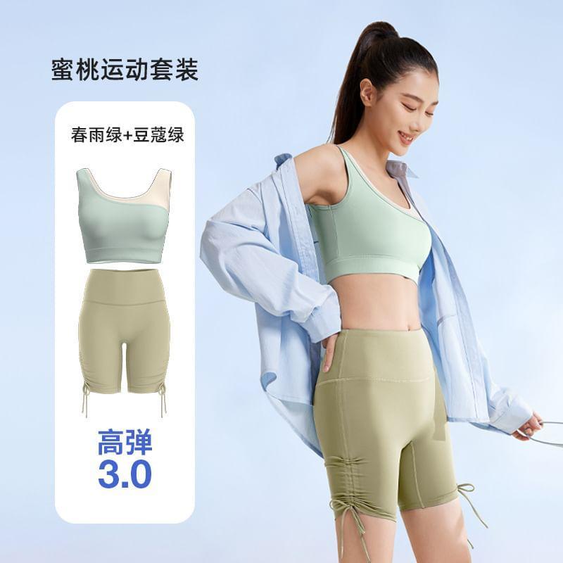 Set: Two Tone Sports Bra + High Waist Plain Drawstring Yoga Shorts Product Image