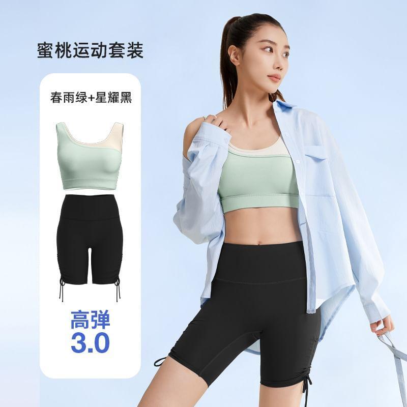 Set: Two Tone Sports Bra + High Waist Plain Drawstring Yoga Shorts Product Image