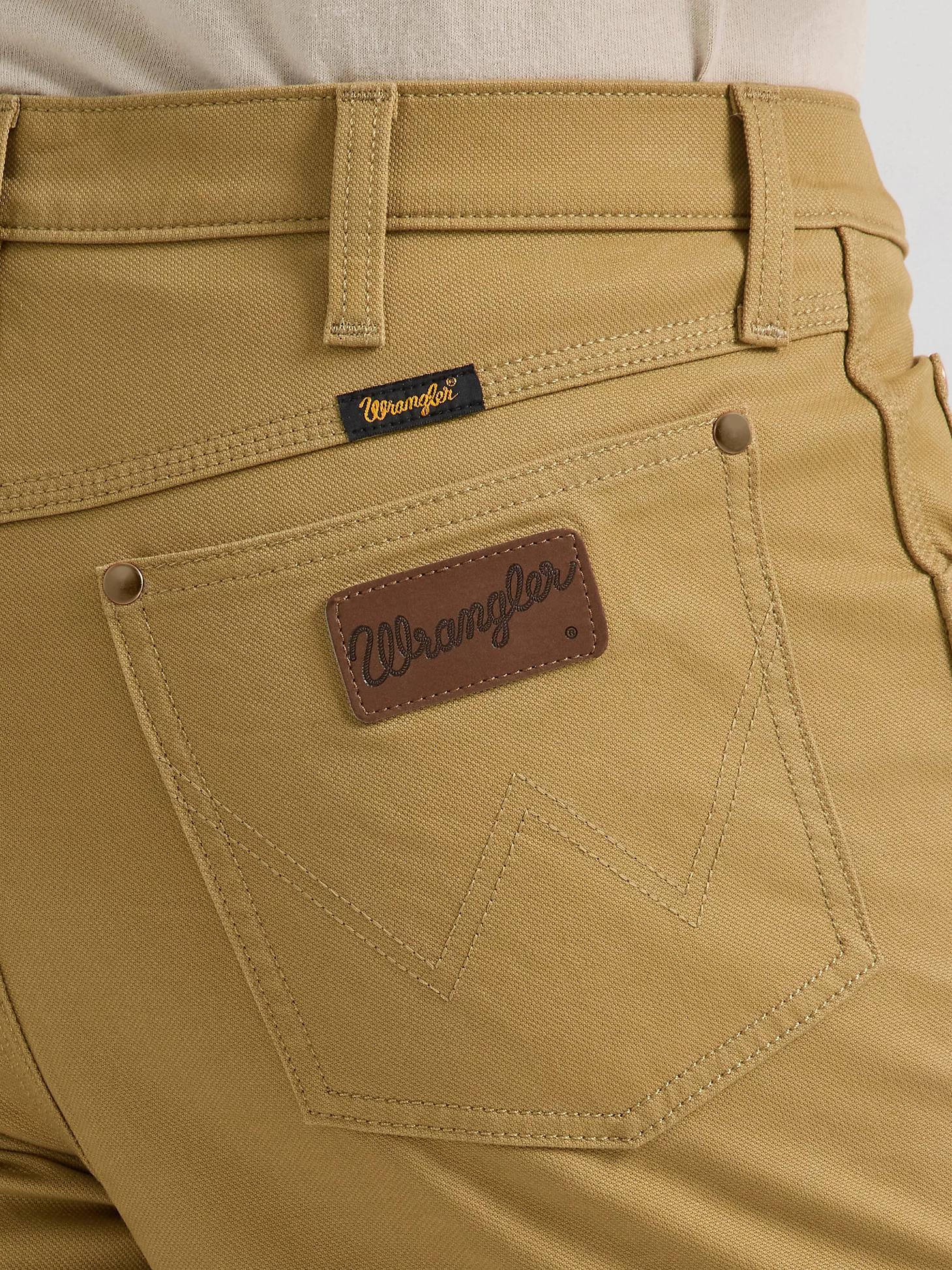 Premium Performance Tough Comfort Cowboy Cut® Regular Fit Canvas Jean | Men's JEANS | Wrangler® Product Image