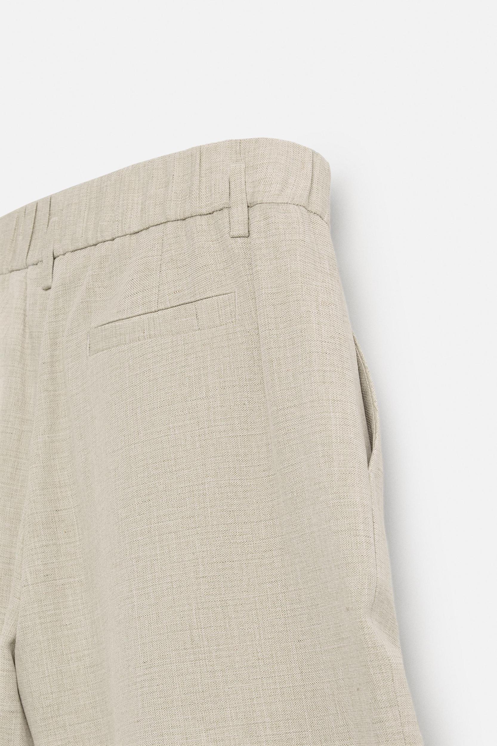 PLEATED WIDE FIT BERMUDA SHORTS Product Image