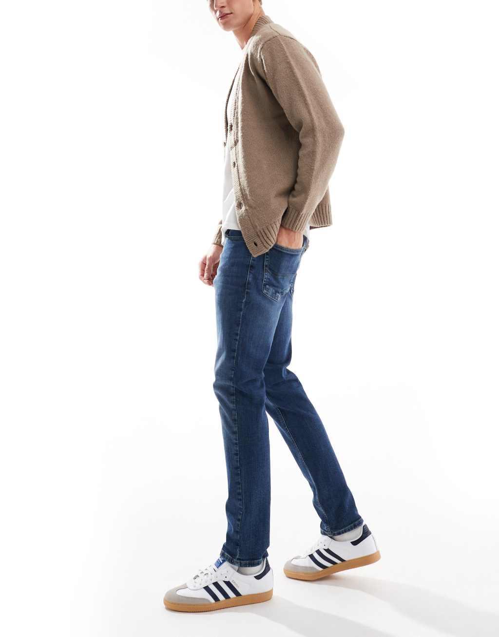 Tommy Jeans Scanton slim jeans in dark wash Product Image