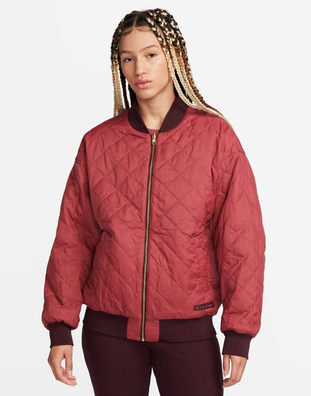 Nike Road To Wellness bomber jacket in burgundy Product Image