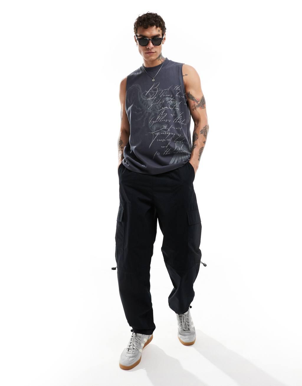 ASOS DESIGN relaxed tank top in black with grunge all over print Product Image