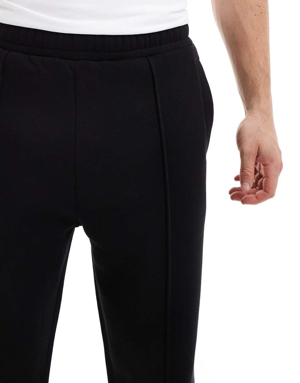 Bershka wide leg pintuck sweatpants in black  Product Image