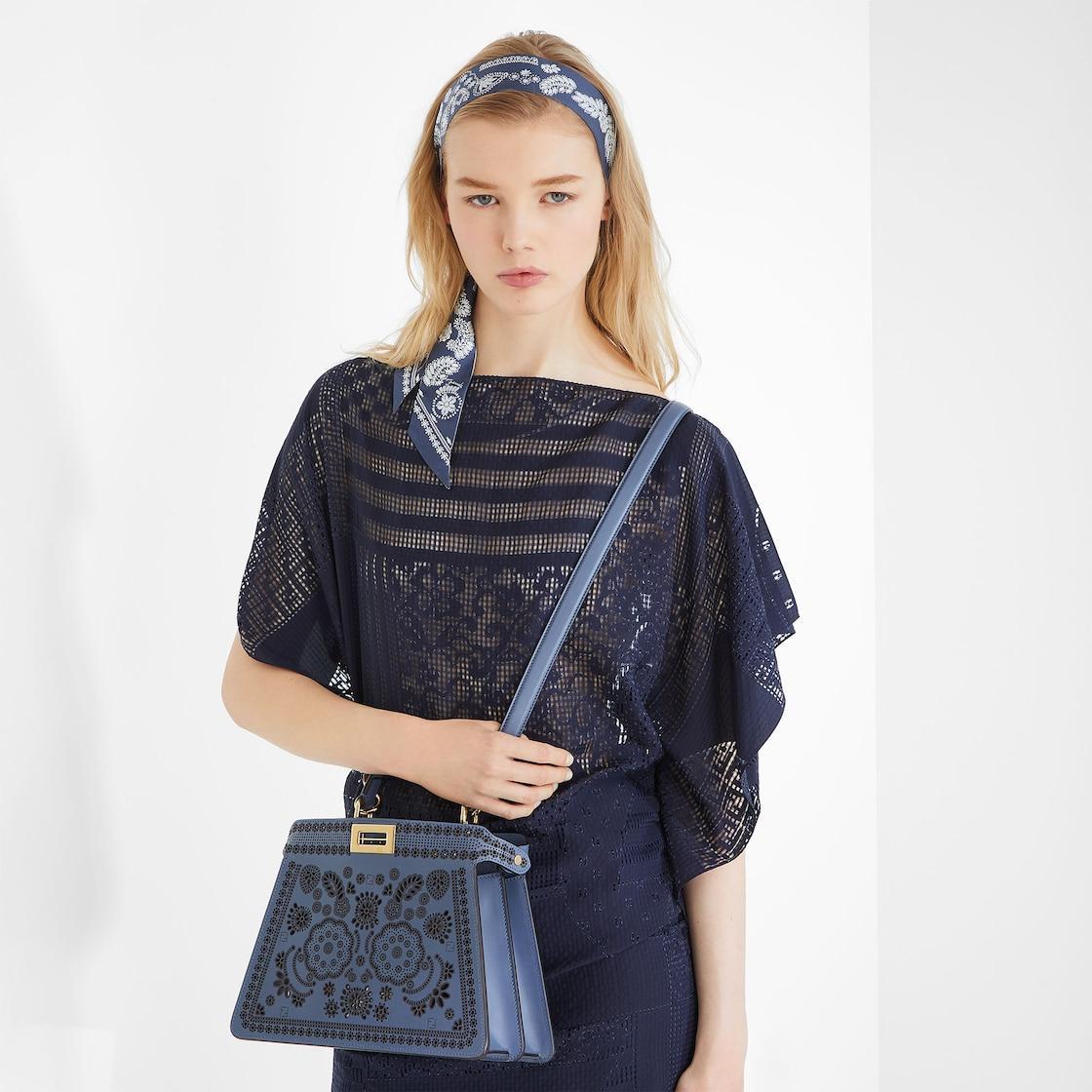Peekaboo ISeeU SmallBlue leather bag with laser-cut Coral Bandana motif Product Image