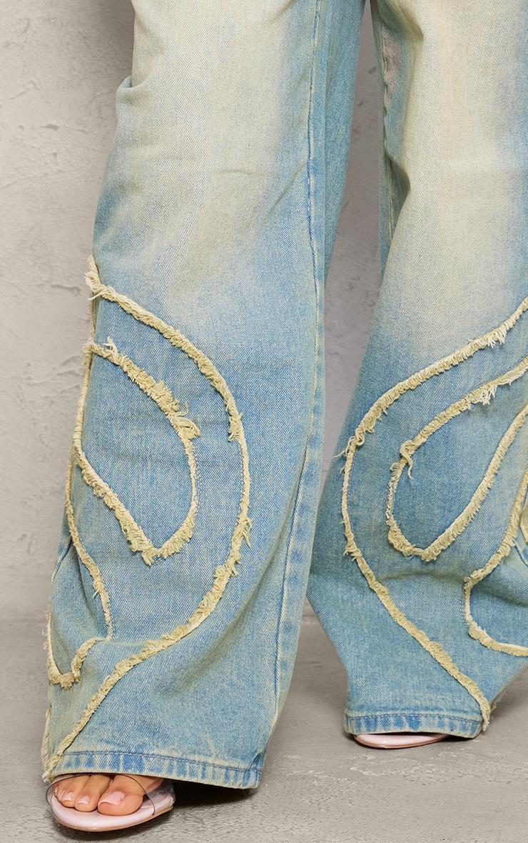 Petite Vintage Bleach Wash Mid Rise Embroidered Wide Leg Jeans Product Image