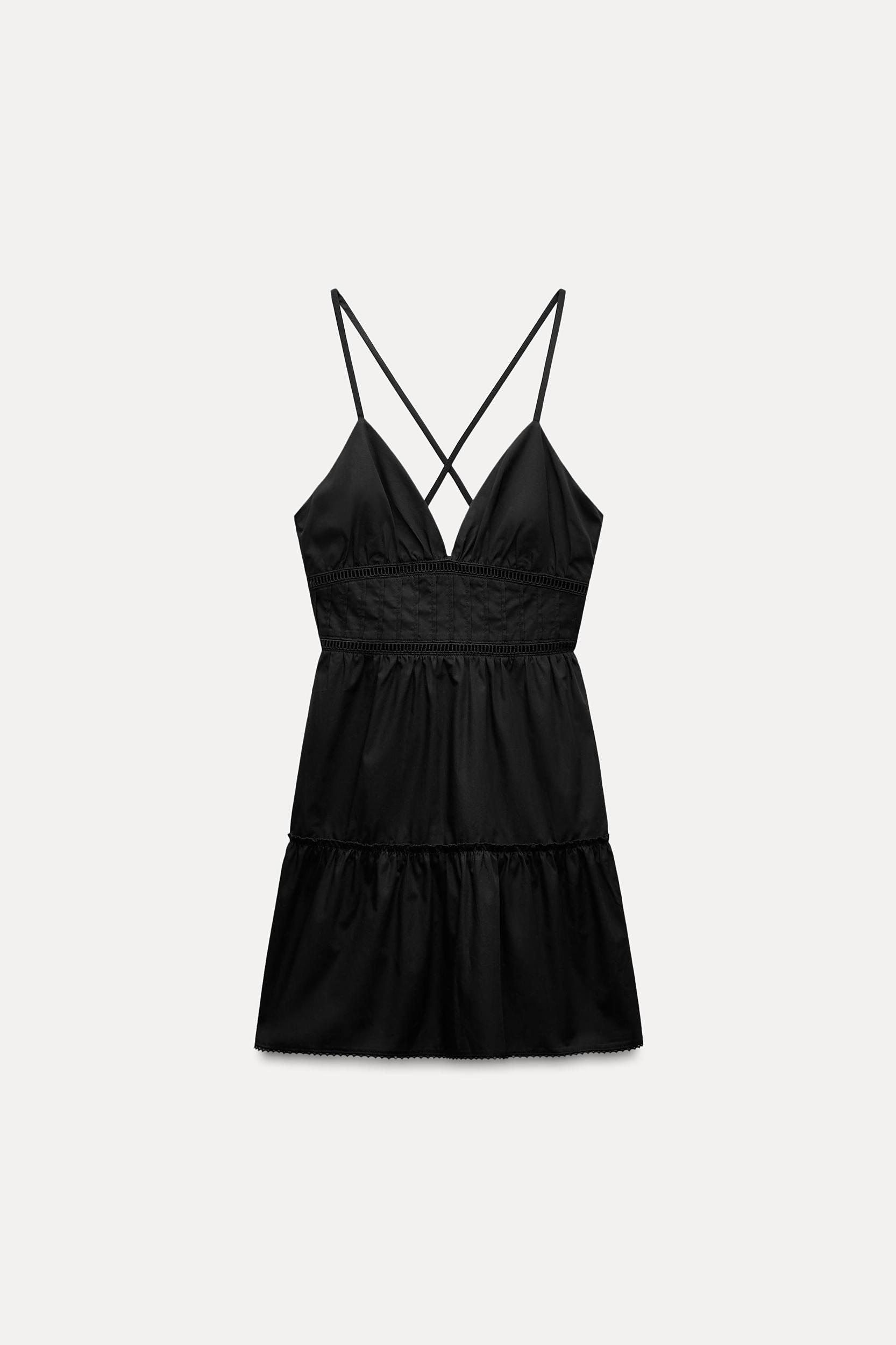 V-neck dress with thin straps that cross at back. Tonal lace insert detail. Side hidden in-seam zip closure. Product Image
