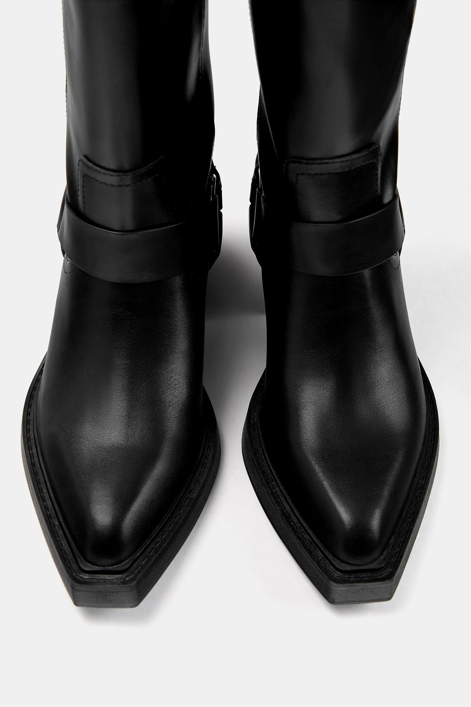 Buckled cowboy boots Product Image