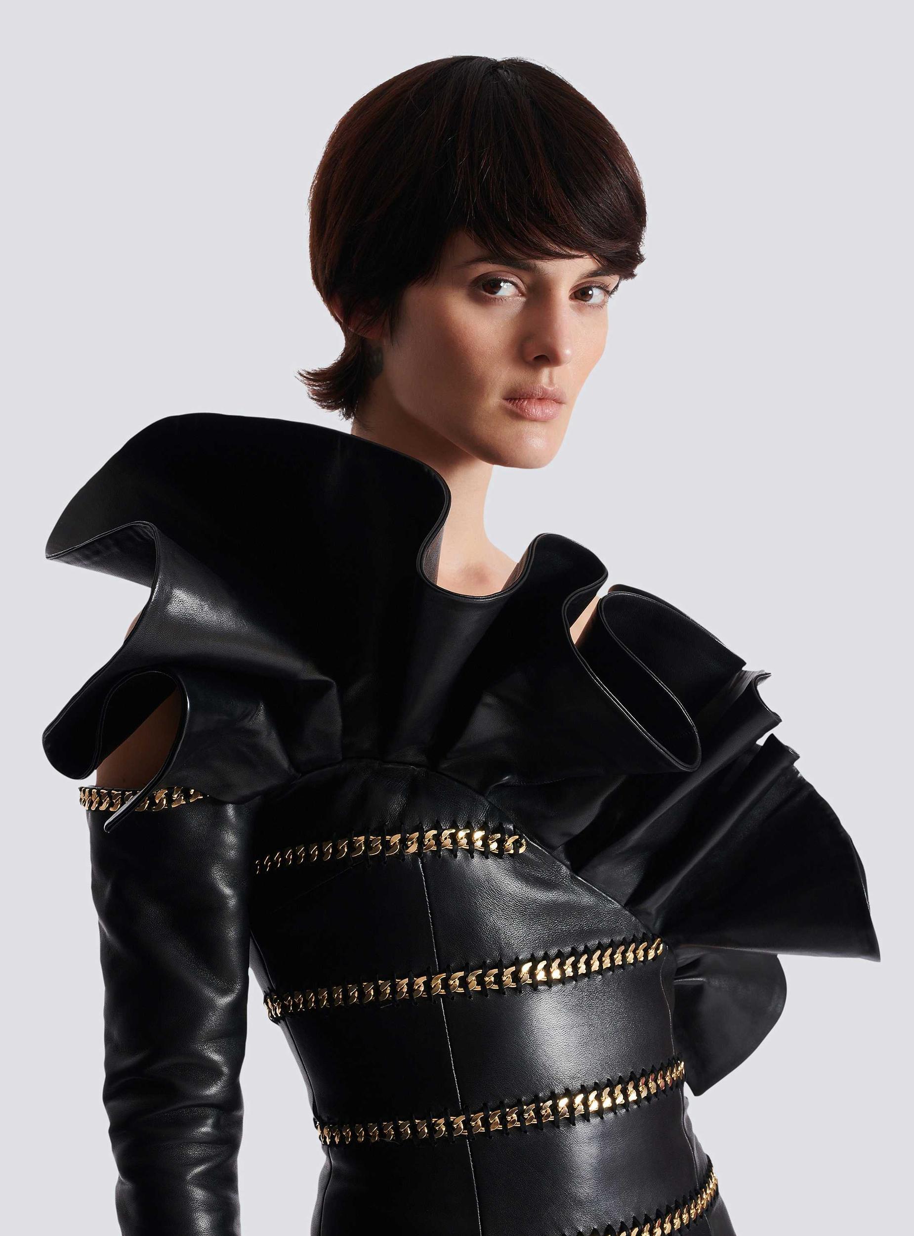 Asymmetric leather bodycon dress with chains Product Image