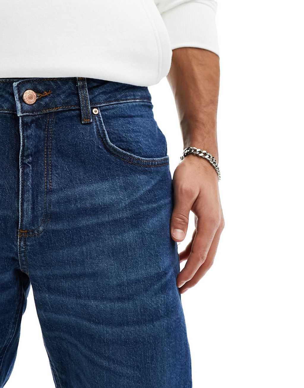 ASOS DESIGN stretch tapered jeans in vintage dark wash Product Image