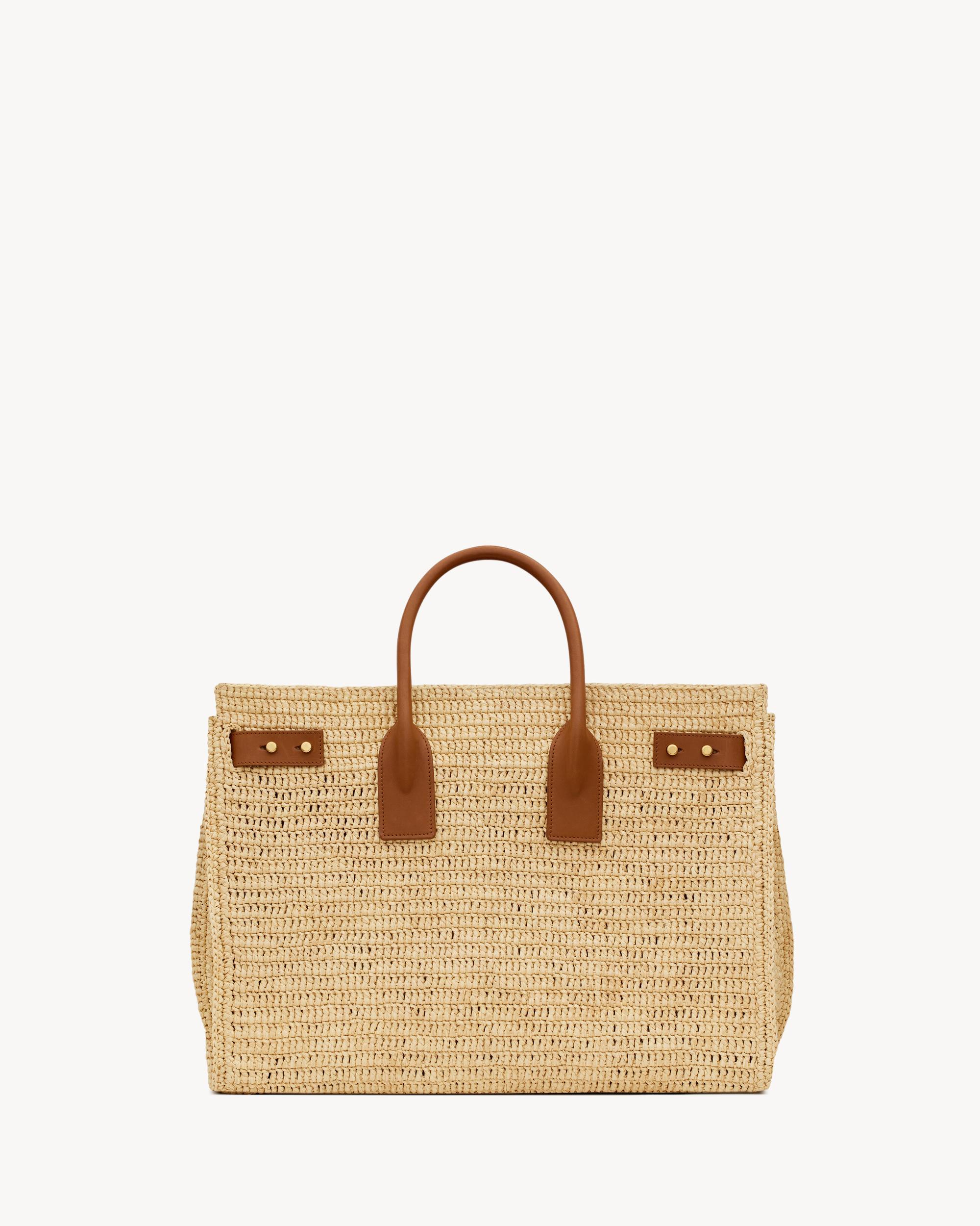 SAC DE JOUR supple in raffia and leather - MEDIUM Product Image