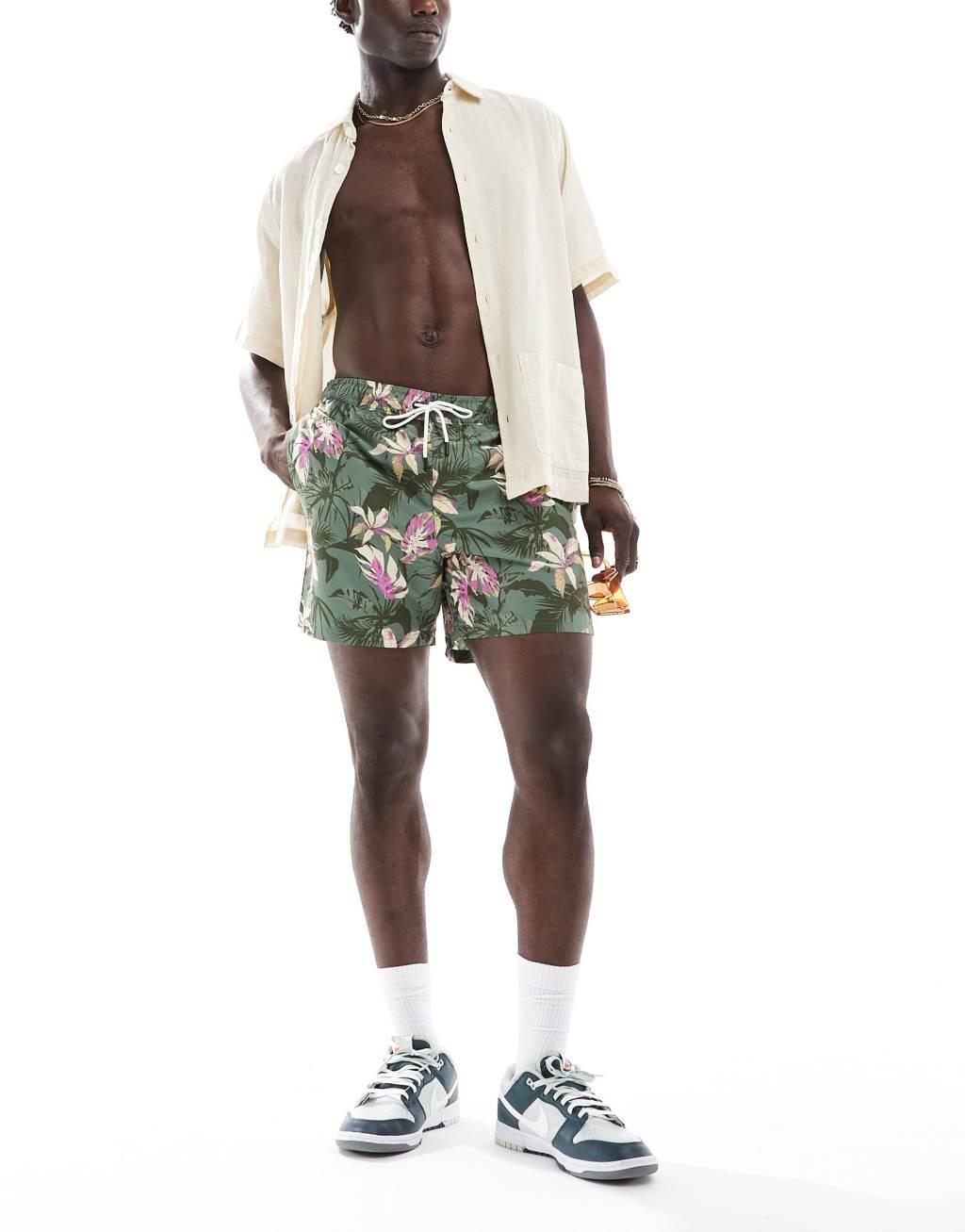 Jack & Jones swim shorts with floral print in green Product Image