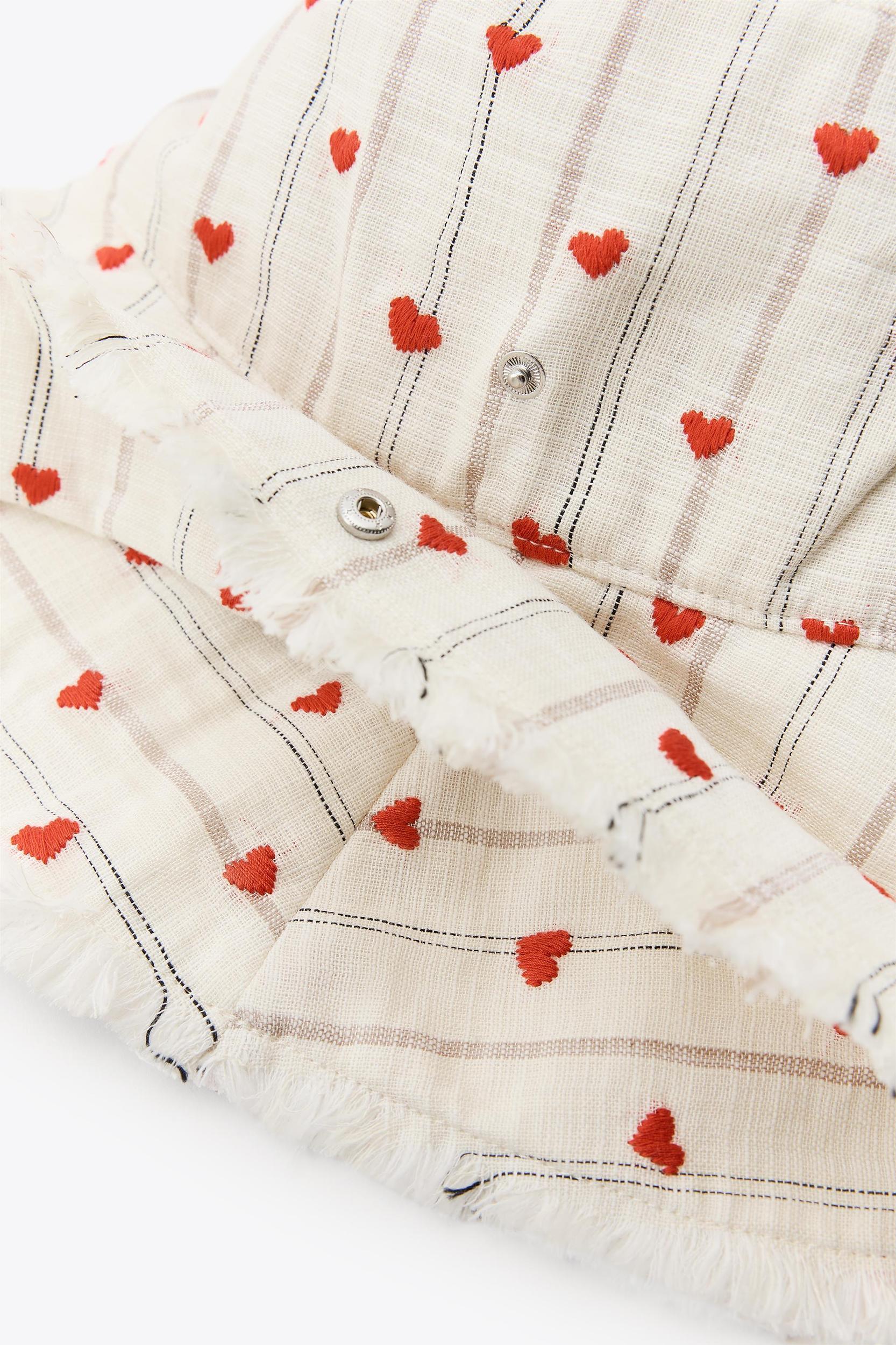 STRIPED HEART EMBROIDERED BUCKET HAT Product Image