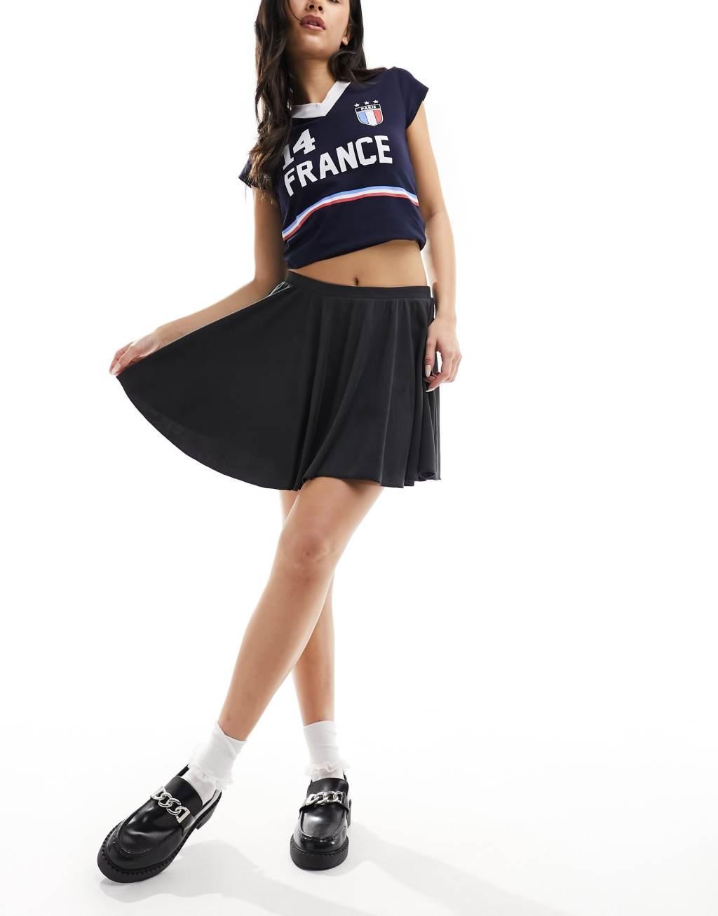 Monki super soft cupro A-line mini skirt in black Product Image