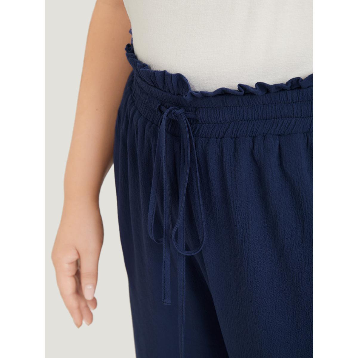 Plus Size Solid Paperbag Waist Asymmetrical Hem Wide Leg Pants Women Indigo Elegant High Rise Dailywear Pants BloomChic 10/M Product Image