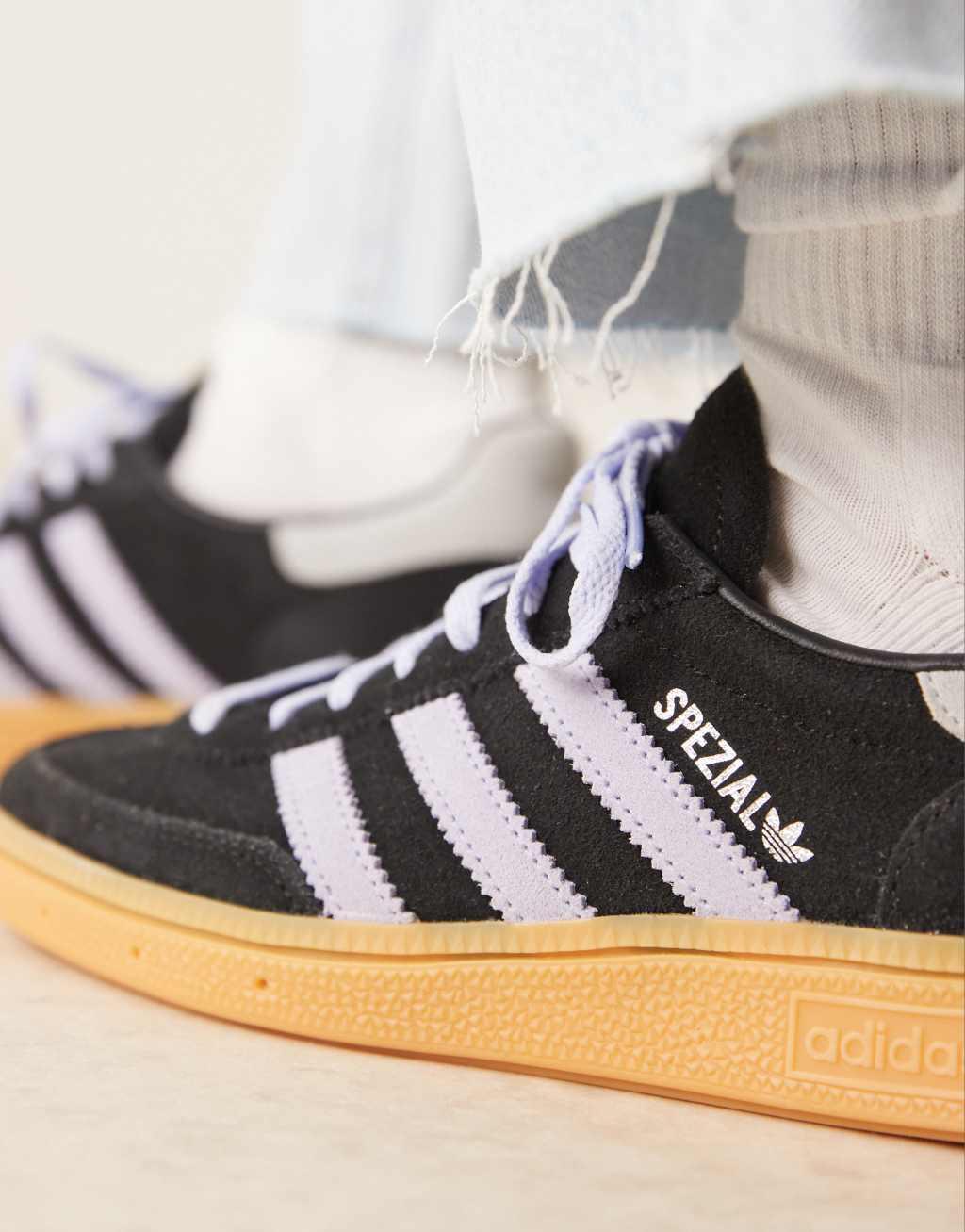 adidas Originals Handball Spezial sneakers in black and blue Product Image