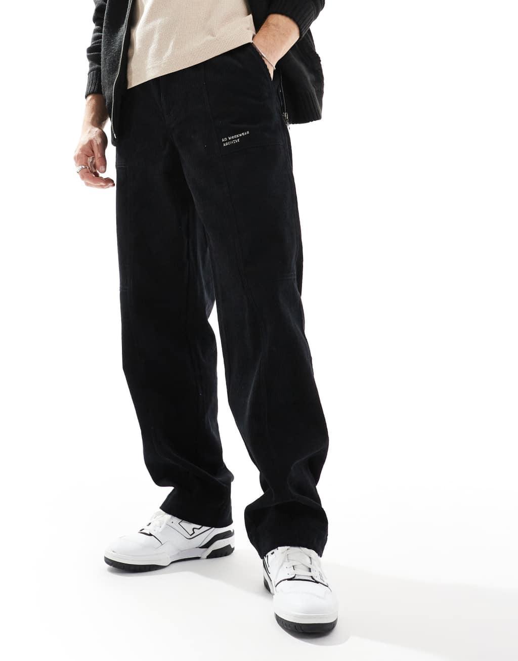ASOS DESIGN baggy corduroy pants with embroidered patch in black Product Image