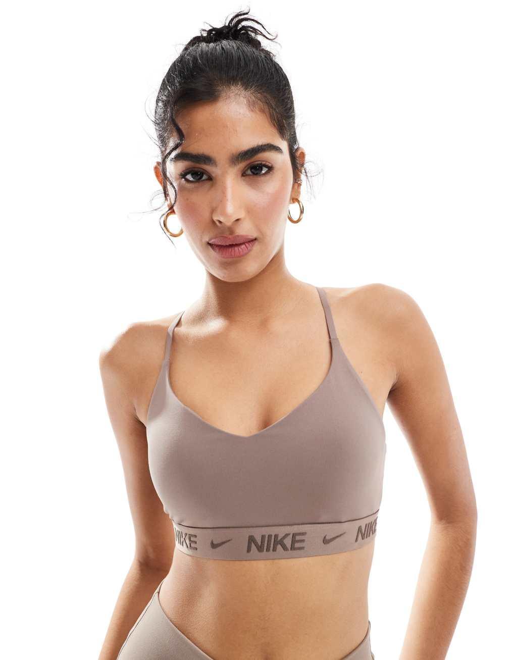 Nike Training Indy light support sports bra in brown Product Image