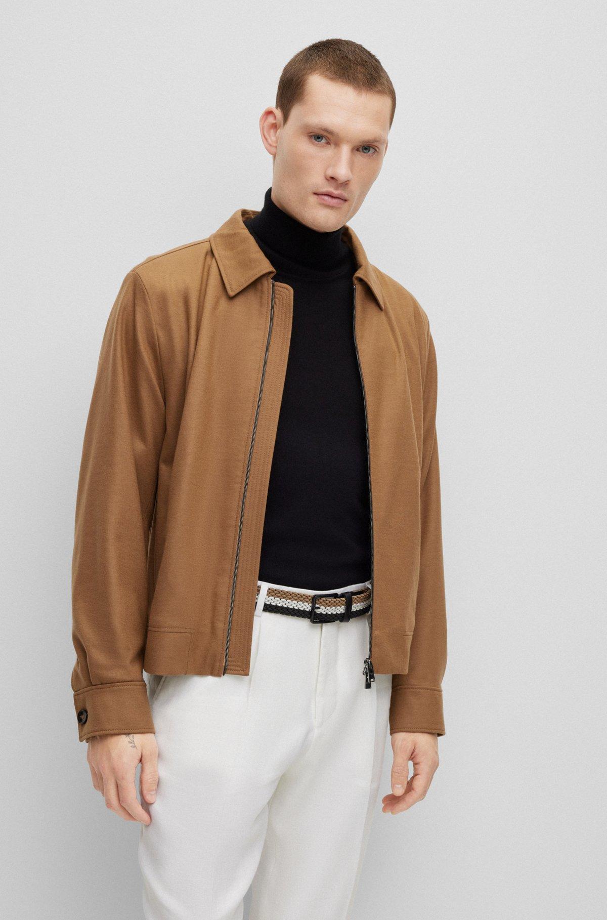 Woven belt with leather trims and contrasting color detail Product Image