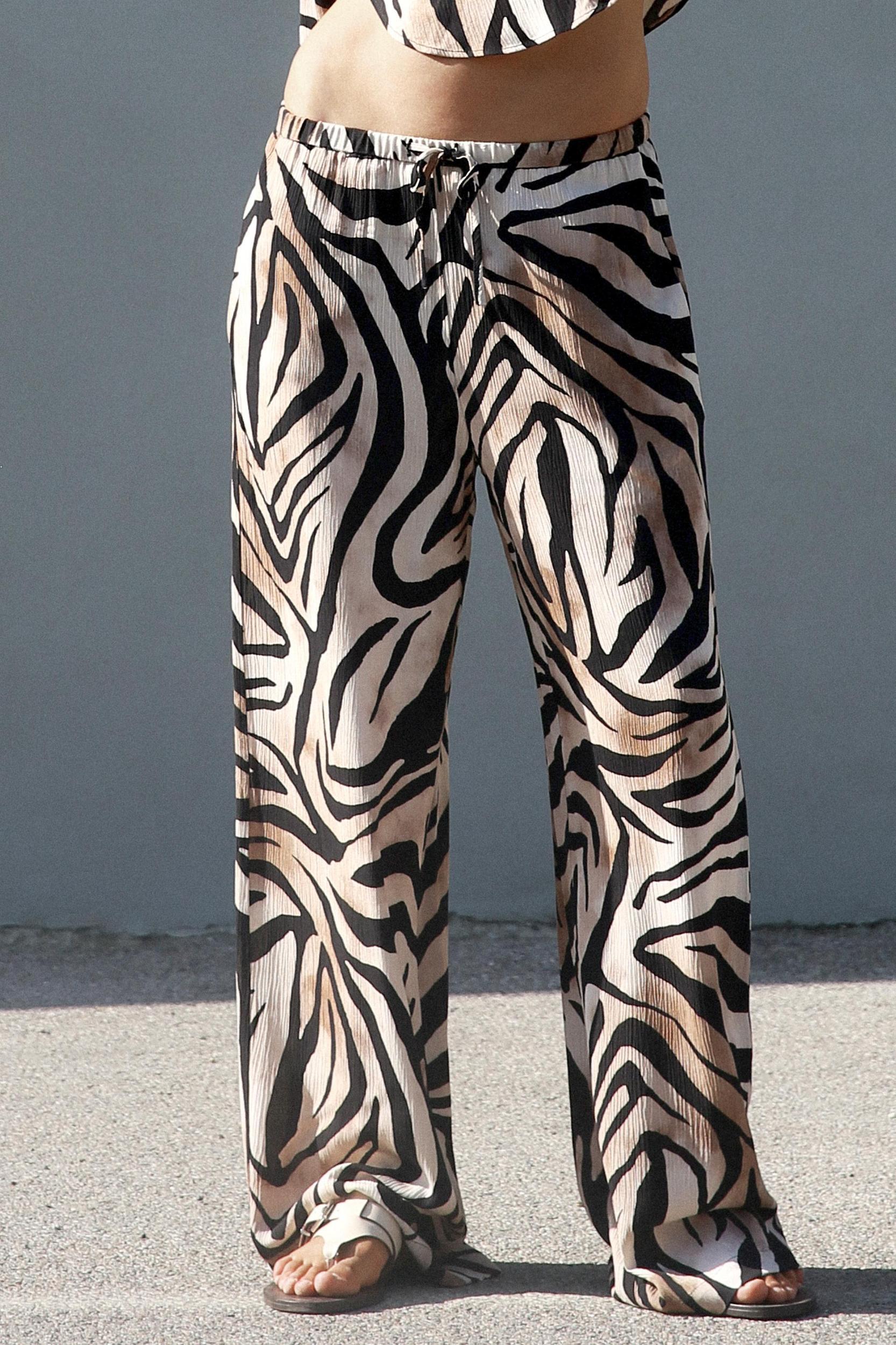 WIDE LEG ANIMAL PRINT PANTS Product Image