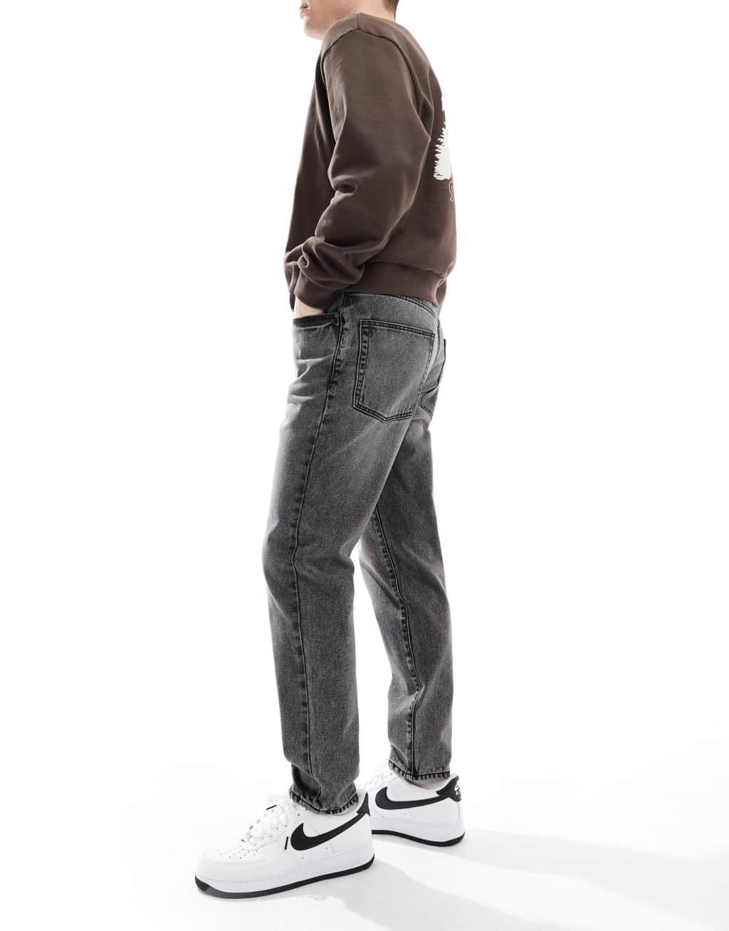 ASOS DESIGN tapered jeans in washed black Product Image