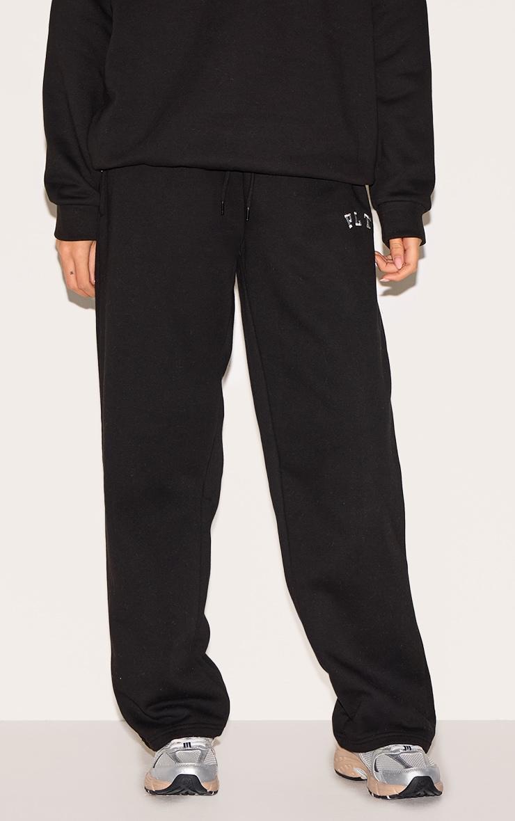 PRETTYLITTLETHING Black Logo Print Oversized Wide Leg Sweatpants Product Image