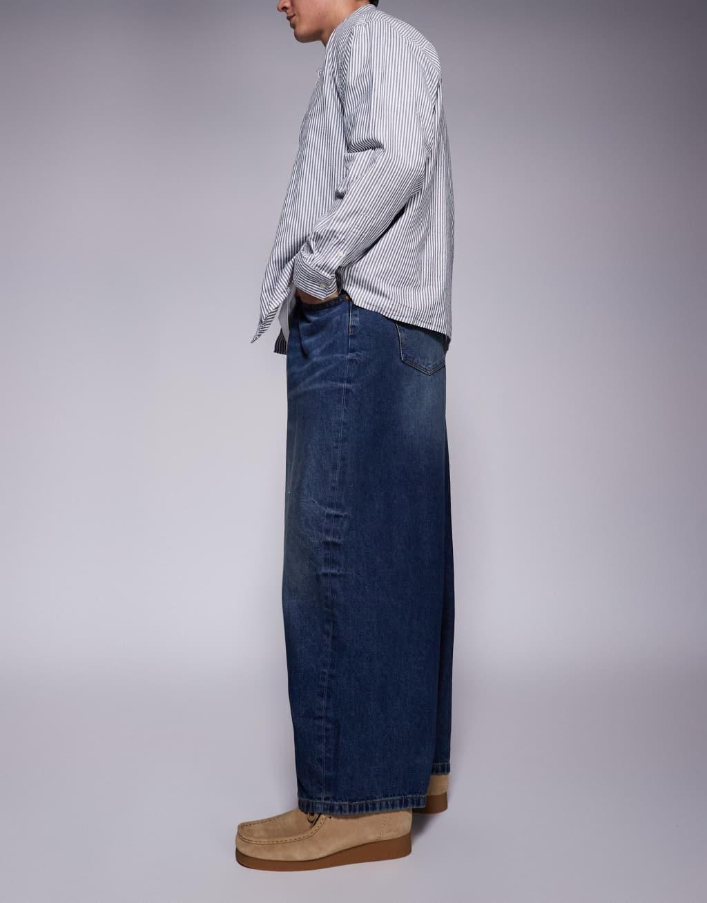 ASOS DESIGN oversized baggy fit jeans in vintage dark wash blue Product Image