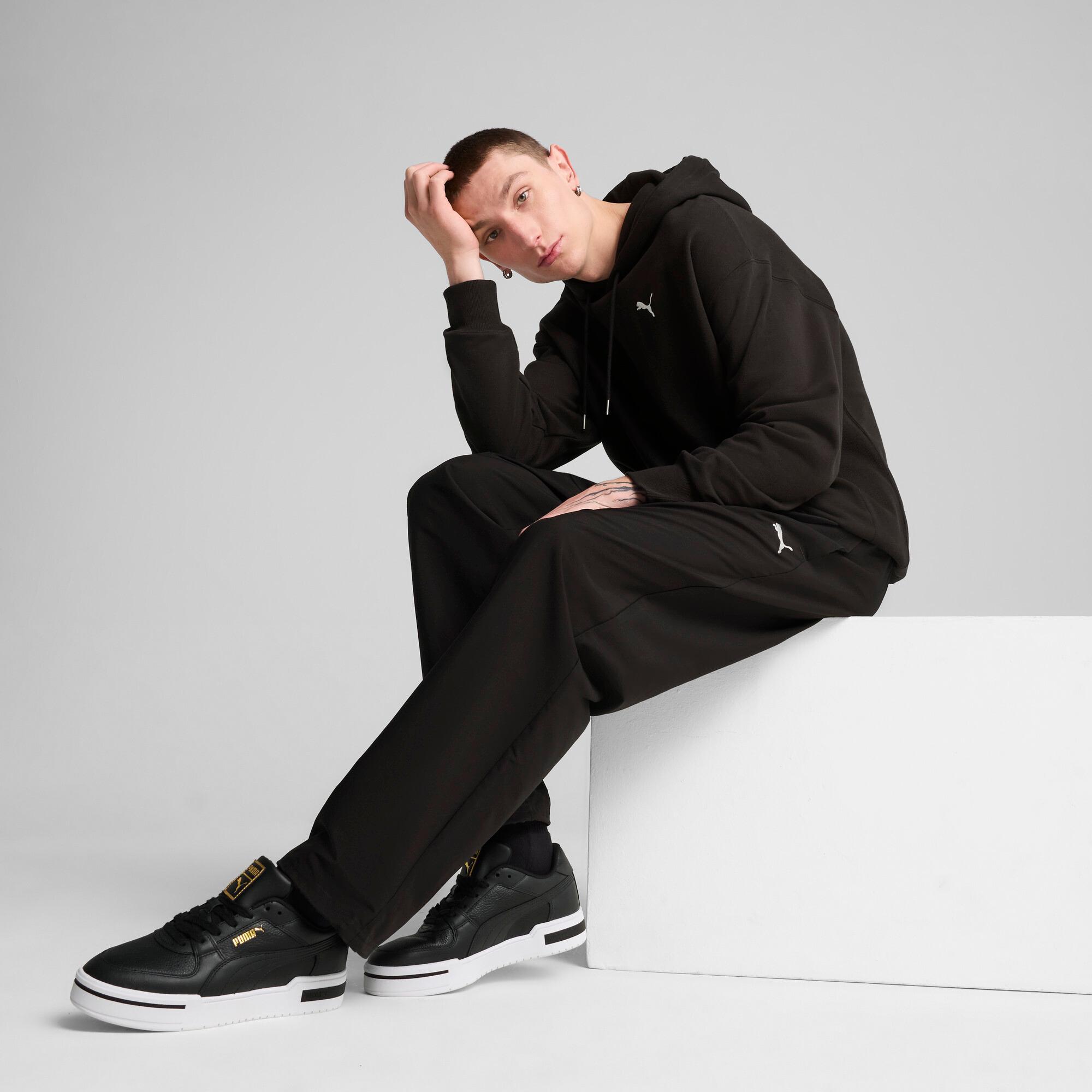 PUMA WARDROBE ESSENTIALS Men's Relaxed Hoodie Product Image