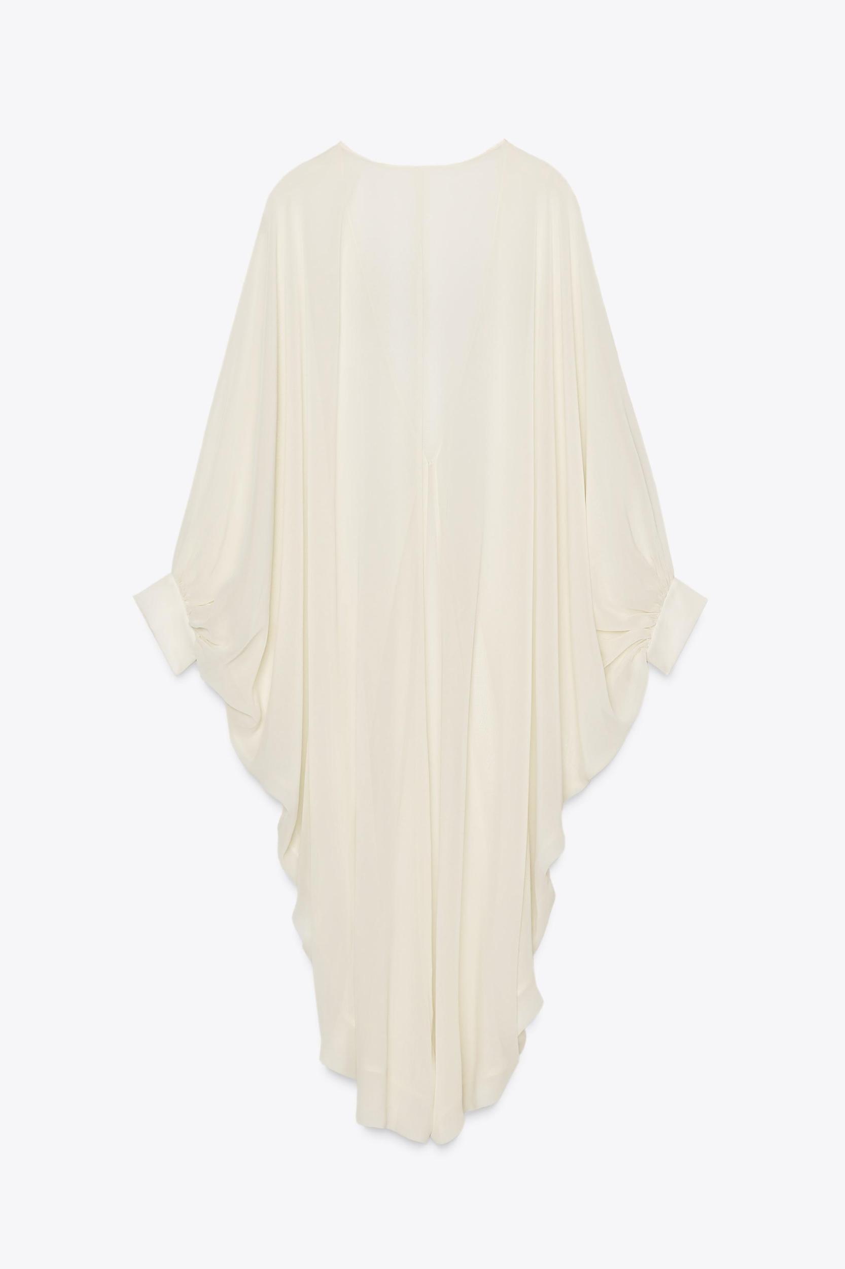 LIMITED EDITION SEMI-SHEER CAPE Product Image
