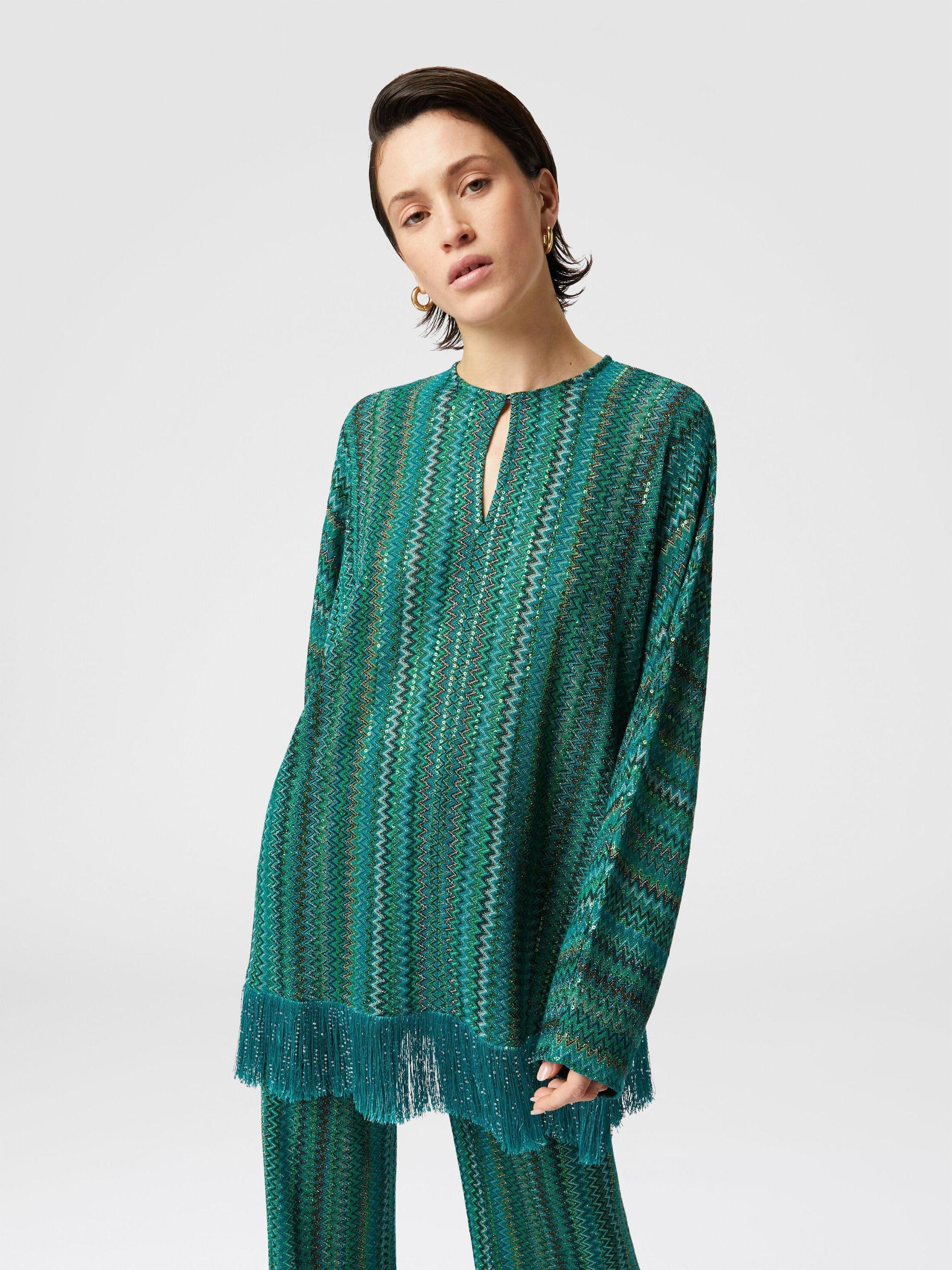Zigzag long-sleeved blouse with sequins and fringes Product Image