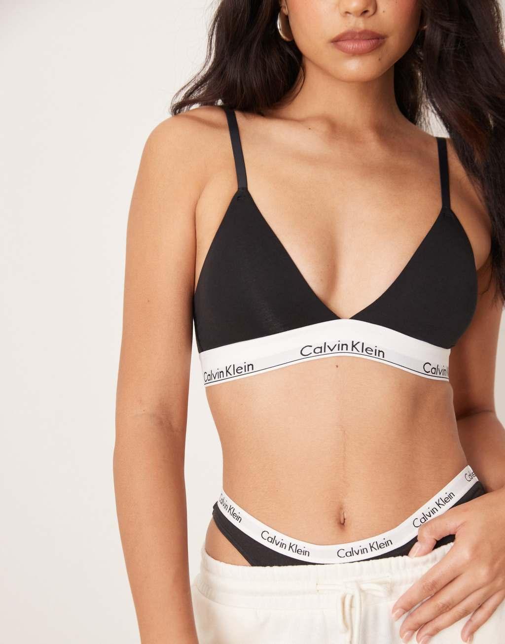 Calvin Klein modern cotton lightly lined triangle logo tape bralet in black Product Image