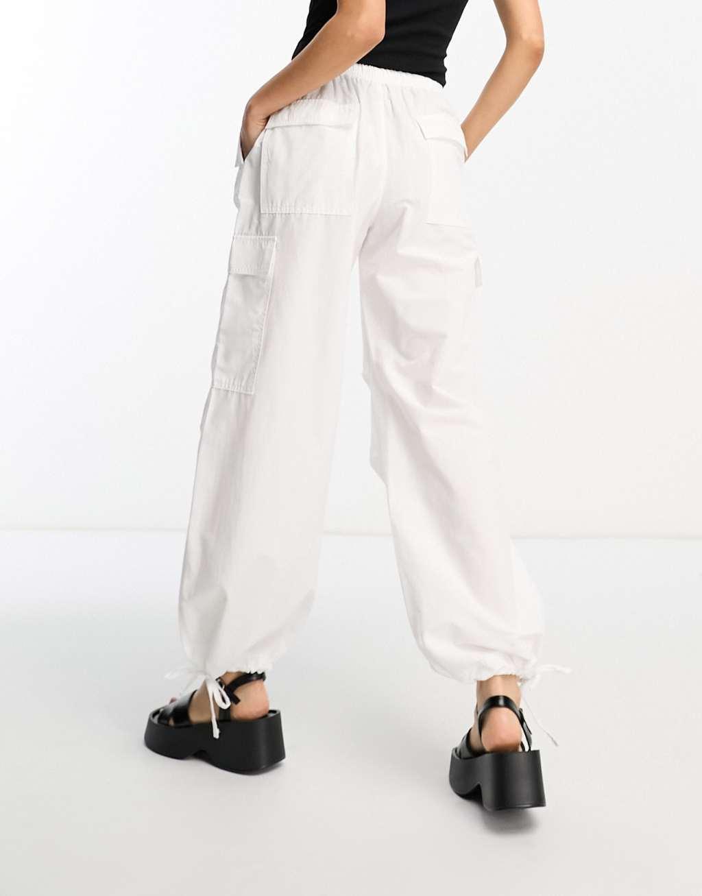 Bershka Petite tie waist nylon cargo parachute pants Product Image